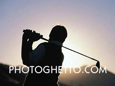 Golfer at Sunset Photo Image